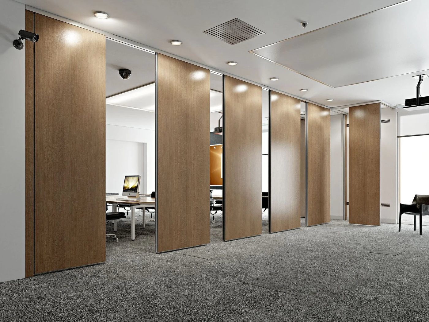 An operable wall partition dividing a flexible room