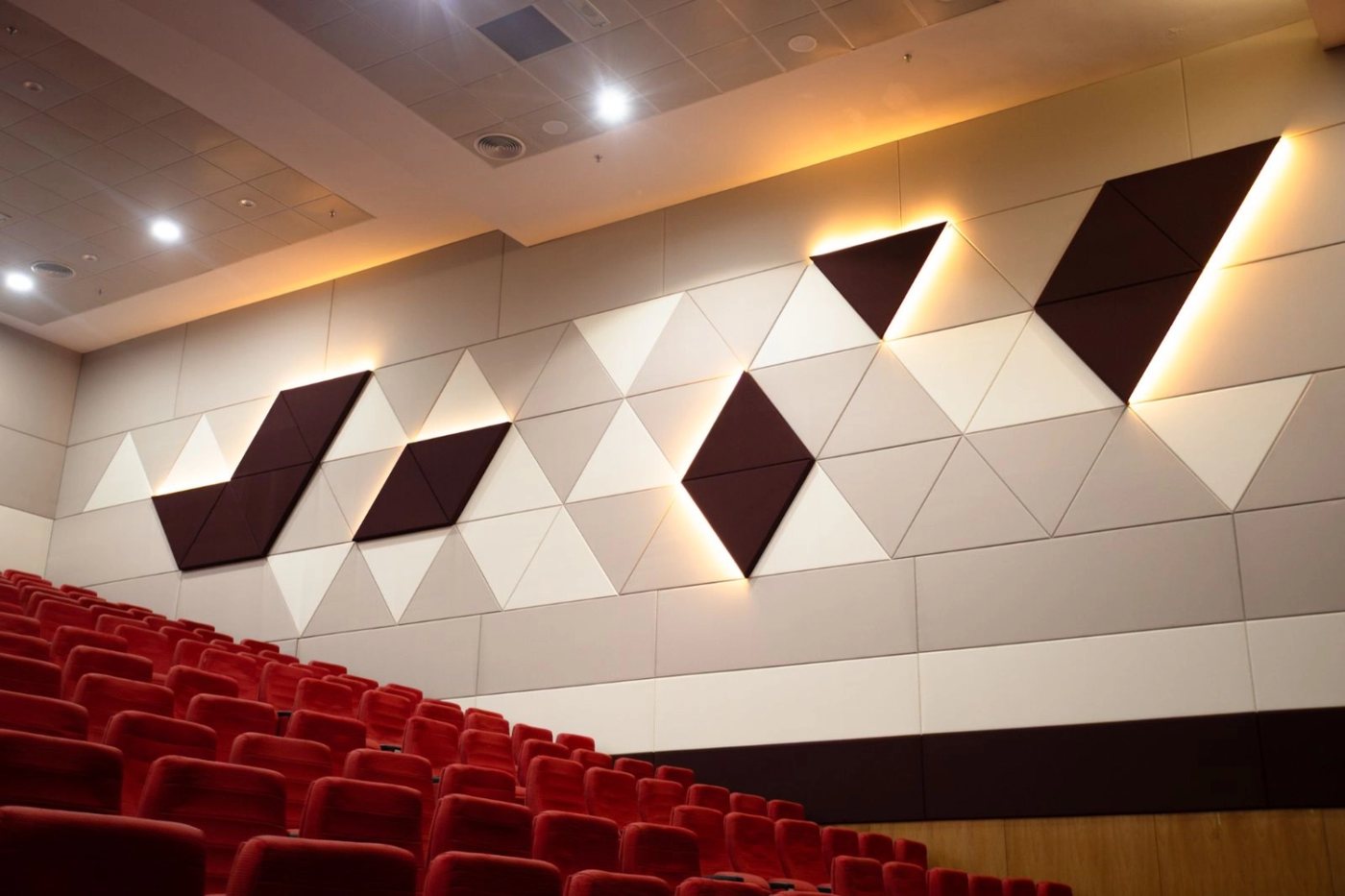 High-absorption acoustic wall panels installed in a room