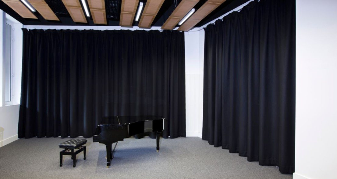 Acoustic curtains used as sound-dampening drapery