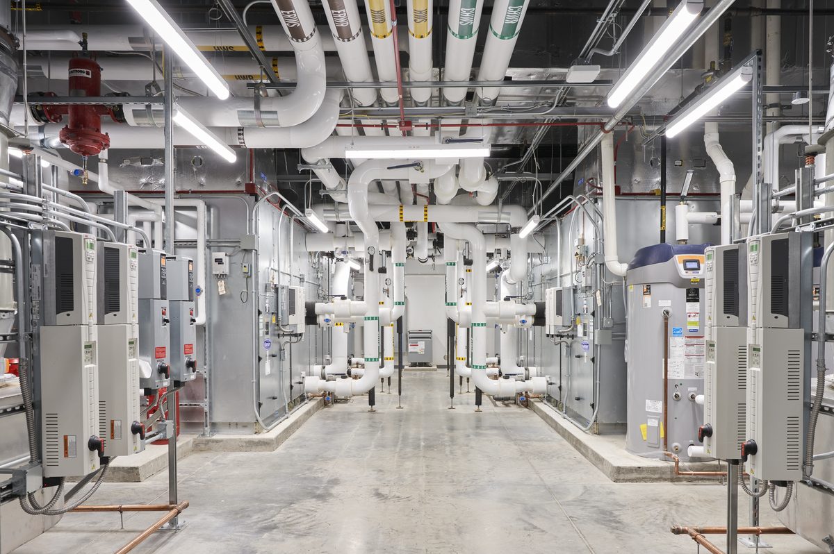 A mechanical utility space treated to contain equipment noise